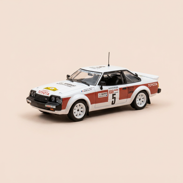 Voiture miniature - Toyota Célica 2000GT blanche et rouge numéro 5 - rallye des 1000 pistes 1979