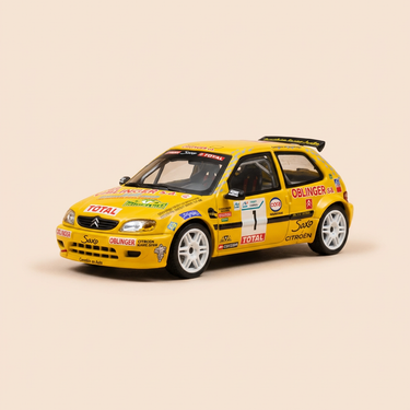 Voiture miniature - Citroën Saxo Kit-Car jaune numéro 1 - rallye des vins Mâcon 1999