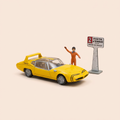 Voiture miniature - Voiture jaune Vaillante Mistral Gt (Album De l'huile sur la piste) - Bande Dessinée Michel Vaillant