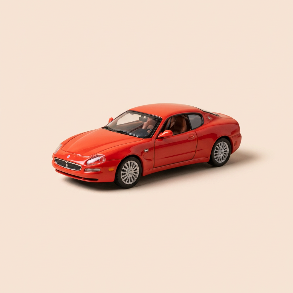 Voiture miniature - Masérati coupé rouge de 2004 - Auto Plus