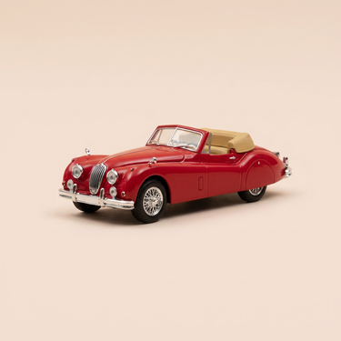 Voiture miniature - Jaguar XK140 rouge de 1956 - Auto Plus