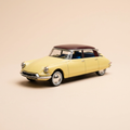 Voiture miniature - Citroën DS 19 jaune et toit marron salon de l'auto de 1955 (sous blister)