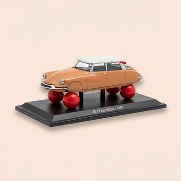 Voiture miniature - Citroën ID 19 sur ballons marron et toit blanc cassé de 1959 (sous blister)