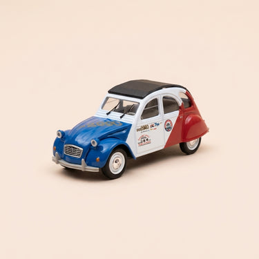 Voiture miniature - Citroën 2 CV 6 bleue, blanche et rouge DEPANN 2000 (sur le capot) - Norev (sous blister)