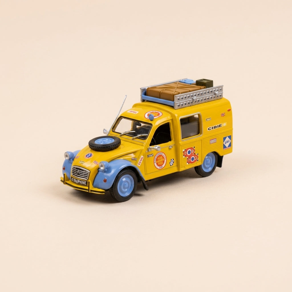 Citroën 2 CV furgonetka żółta z bagażnikiem i akcesoriami - Rallye Paryż-Kabul-Paryż z 1970 roku (w blistrze)