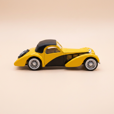 Voiture miniature - Bugatti Atalante découvrable jaune de 1939 (collection Voitures d'exception))