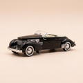 Voiture miniature - Cord 812 noire de 1937 (voiture américaine)