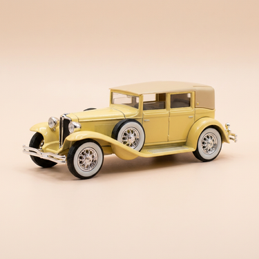 Voiture miniature - Cord L 29 berline jaune? de 1929 (voiture américaine)
