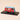 Voiture miniature - Peugeot D3A rouge rosé et bleu avec publicité sur les huiles LABO
