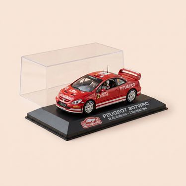 Voiture miniature - Peugeot 307 WRC rouge numéro 7 - rallye de Monté-Carlo de 2005