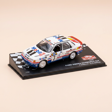Voiture miniature - Ford Sierra Cosworth 4x4 blanche numéro 7 - rallye de Monté-Carlo de 1992