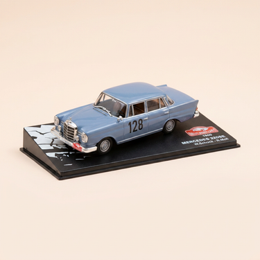 Voiture miniature - Mercedes 220SE bleu/gris? numéro 128 - rallye de Monté-Carlo de 1960