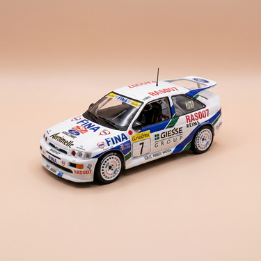 Voiture miniature - Ford Escort RS Cosworth blanche et bleue numéro 7 - rallye de Monté-Carlo de 1995