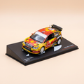 Voiture miniature - Citroën C4 WRC jaune, rouge et noire numéro 11 - rallye du Mexique de 2010