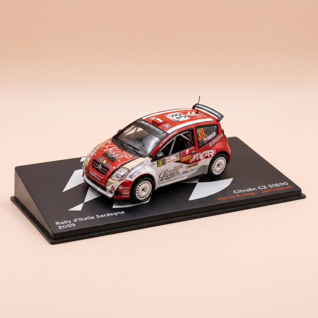 Voiture miniature - Citroën C2 S1600 rouge et blanche numéro 38 - rallye de Sardaigne (Italie) de 2009