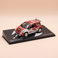 Voiture miniature - Citroën C2 S1600 rouge et blanche numéro 38 - rallye de Sardaigne (Italie) de 2009