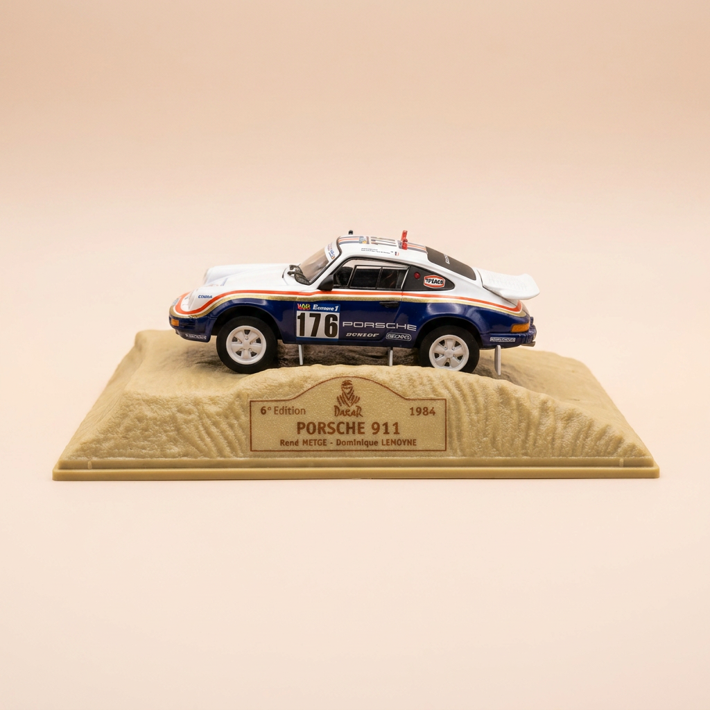Porsche 911 blanche et bleue numéro 176 - Paris-Dakar 1984