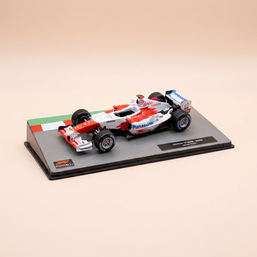 Voiture miniature - Toyota TF104B rouge et blanche de 2004 numéro 16 - Formule 1 de 2004 (Jarno Trulli)