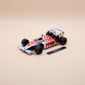 Voiture miniature - Toleman TG184 rouge et blanche numéro 19 - Formule 1 de 1984 (Ayrton Senna)