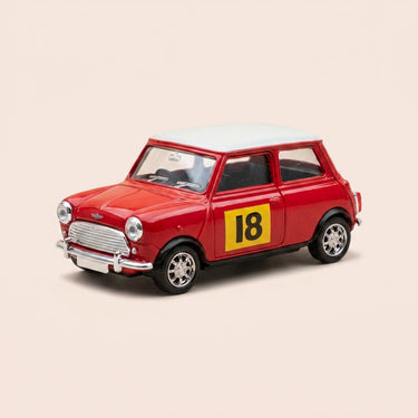 Voiture miniature - Mini Cooper rouge et toit blanc cassé numéro 18 de 1968 - Solido référence 1930