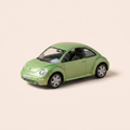 Voiture miniature - Volkswagen New Beetle verte (MANQUE LE RETRO COTÉ CONDUCTEUR)