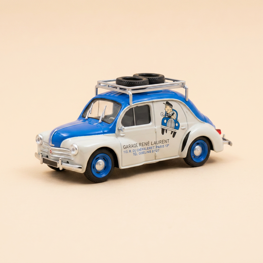 Renault 4 CV berline commerciale bleue et blanche grisée? type R 2070 de 1949 avec publicité pour le garage Laurent à Paris 13ème (blister)