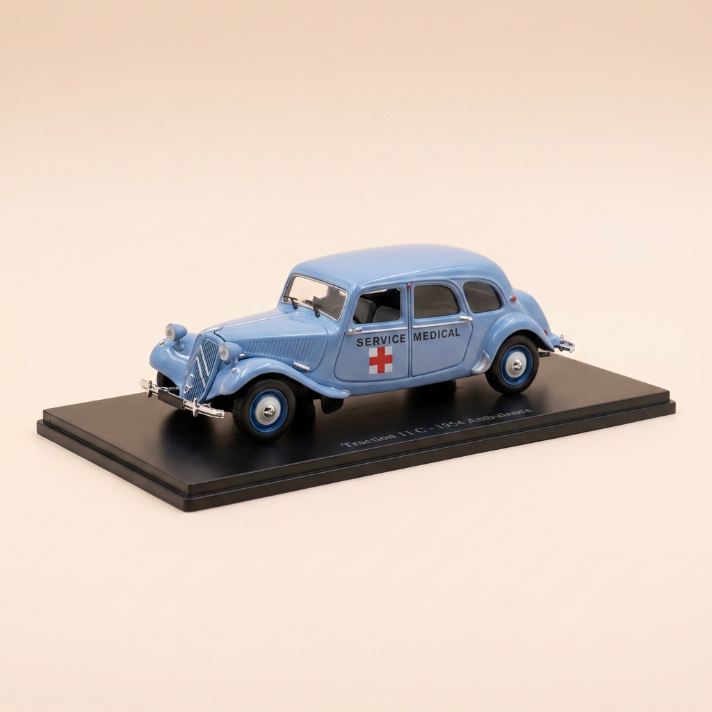 Voiture miniature - Citroën Traction 11C bleue claire de 1954 Ambulance service médical (boite plexi)