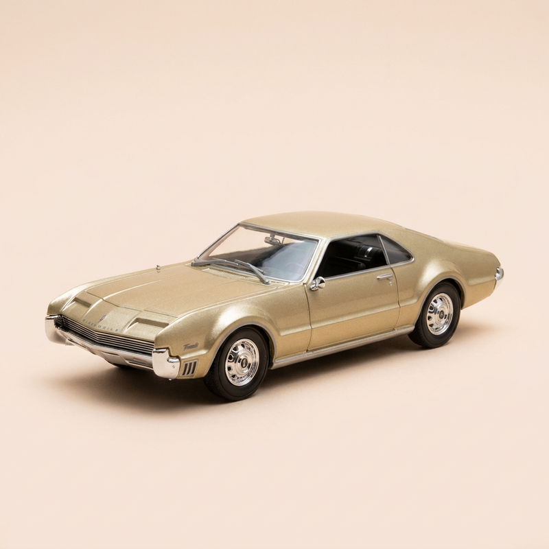 Oldsmobile Toronado marron de 1966 (voiture américaine)