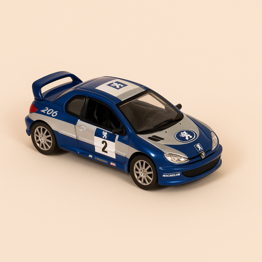 Peugeot 206cc de course bleue et grise avec le numéro 2 saison 2002 (coffret boite rectangle) Norev
