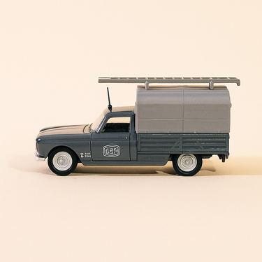 Photo professionnelle de la voiture miniature Peugeot 404 Camionnette Grise De 1964 Ptt La Poste Eligor - Image clean haute qualité