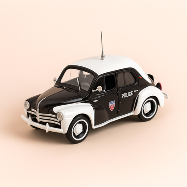 Photo professionnelle de la voiture miniature Renault 4Cv Pie Noire Et Blanche Police De Paris 1956 - Image clean haute qualité