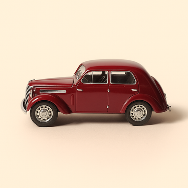 Photo professionnelle de la voiture miniature Renault Juvaquatre Bordeaux De 1946 - Image clean haute qualité