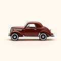 Photo professionnelle de la voiture miniature Renault Juvaquatre Coupe Bordeaux De 1941 - Image clean haute qualité