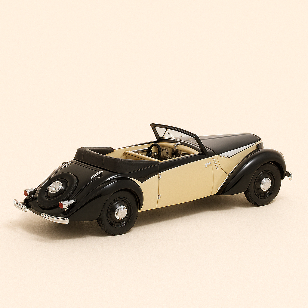 1939 schwaarz a cremefaarweg Rosengart Super Traction
